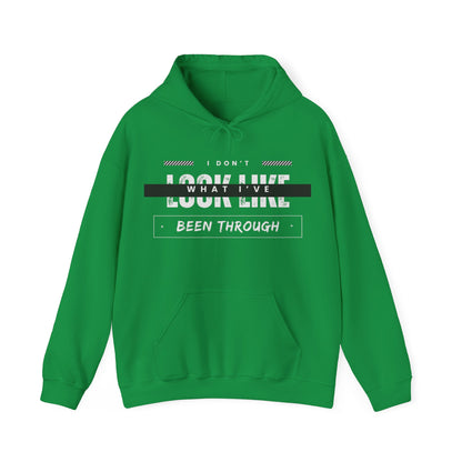 I don't look like what I've been through™ Hooded Sweatshirt